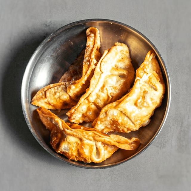 Gyoza 교자  PORK, CHICKEN OR VEGETABLE.